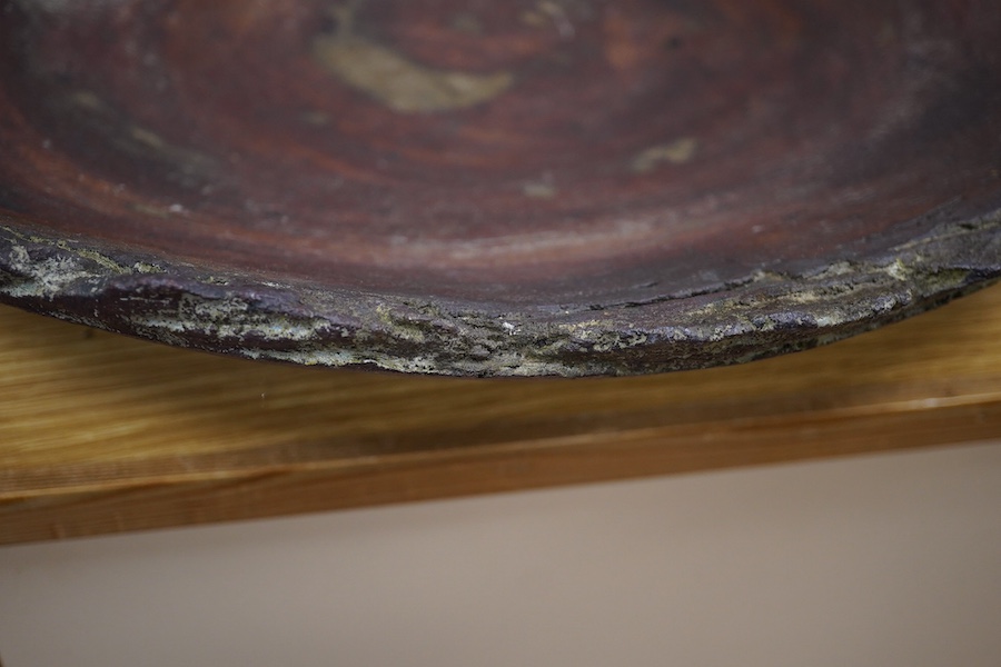 Dennis Fairweather, a large studio pottery flat dish with rough edges, 47cm wide